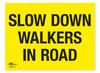 Slow Down Walkers in Road Safety Correx Sign Warning